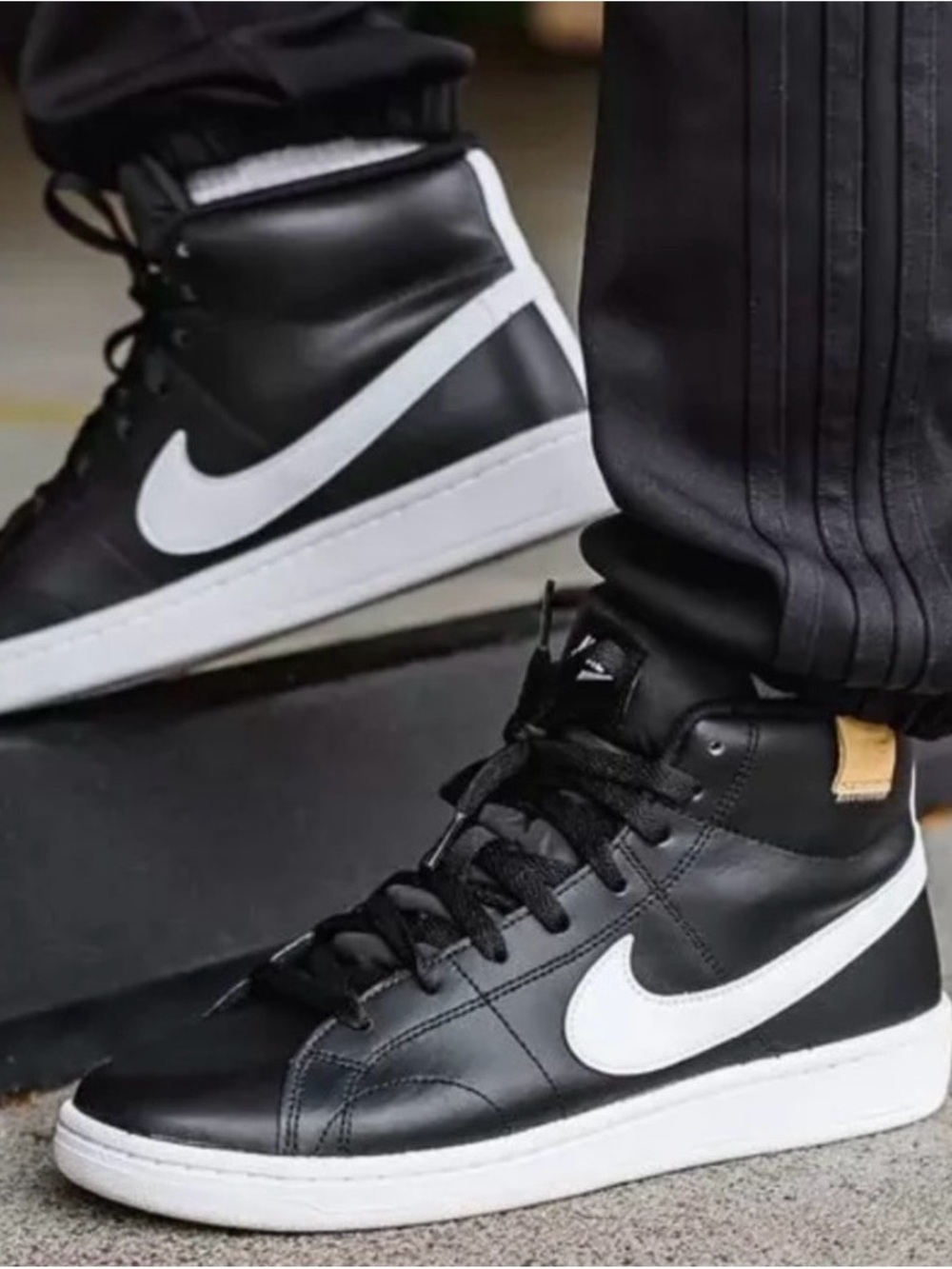 Nike Men’s Black and White Mid-Top Sneakers